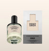Perfume bottle and packaging of Dés & Durga Cognac Reign on a beige background